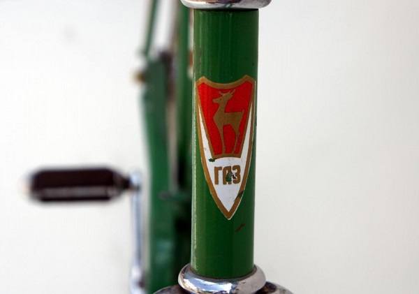 Koulupojan polkupyörän logo